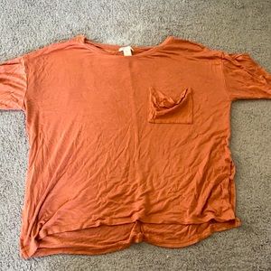 small thin orange t-shirt